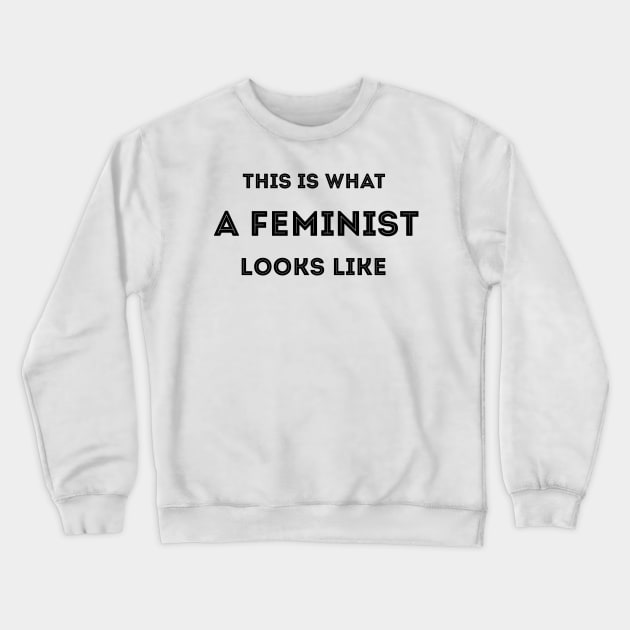 This Is What A Feminist Looks Like Crewneck Sweatshirt by TheGrinningSkull